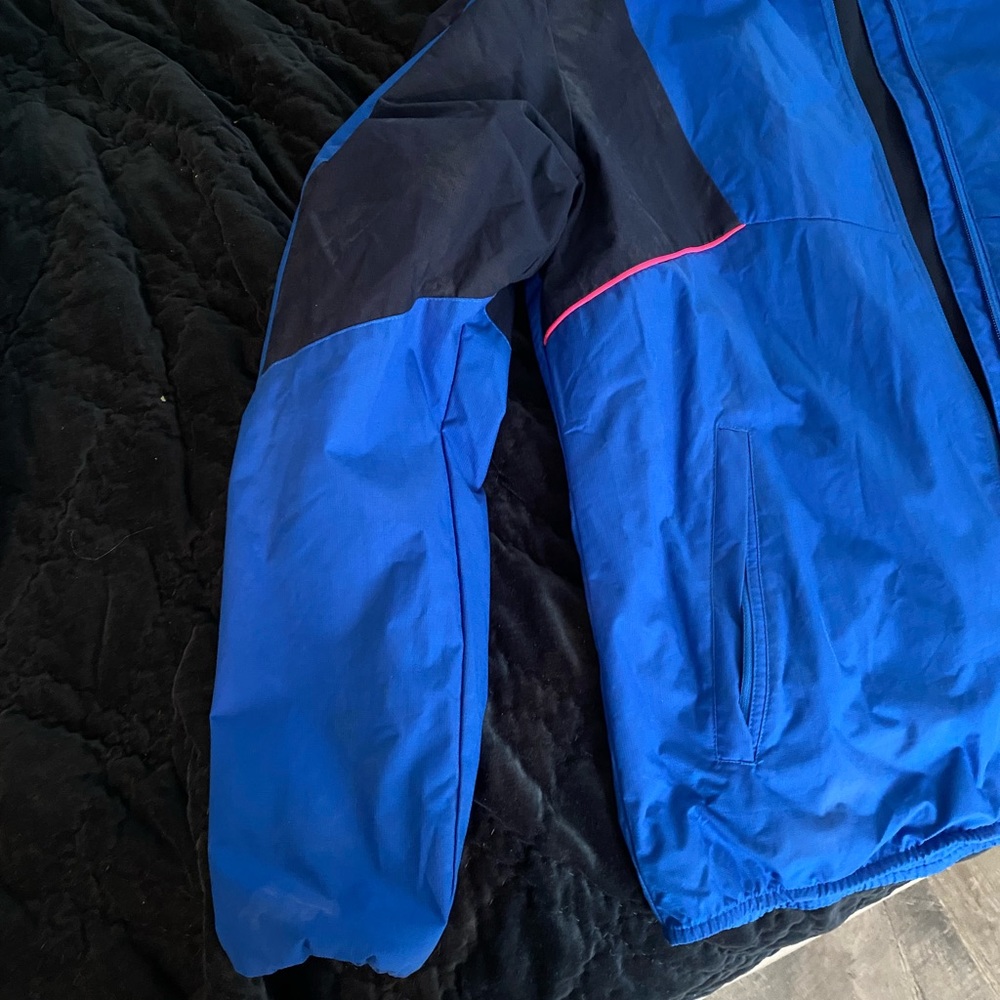 Large PUMA rain coat. No stains or tears. Rarely worn